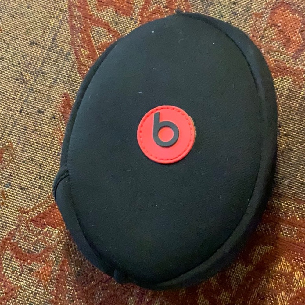 Wired Beats headset. White and red. New condition.